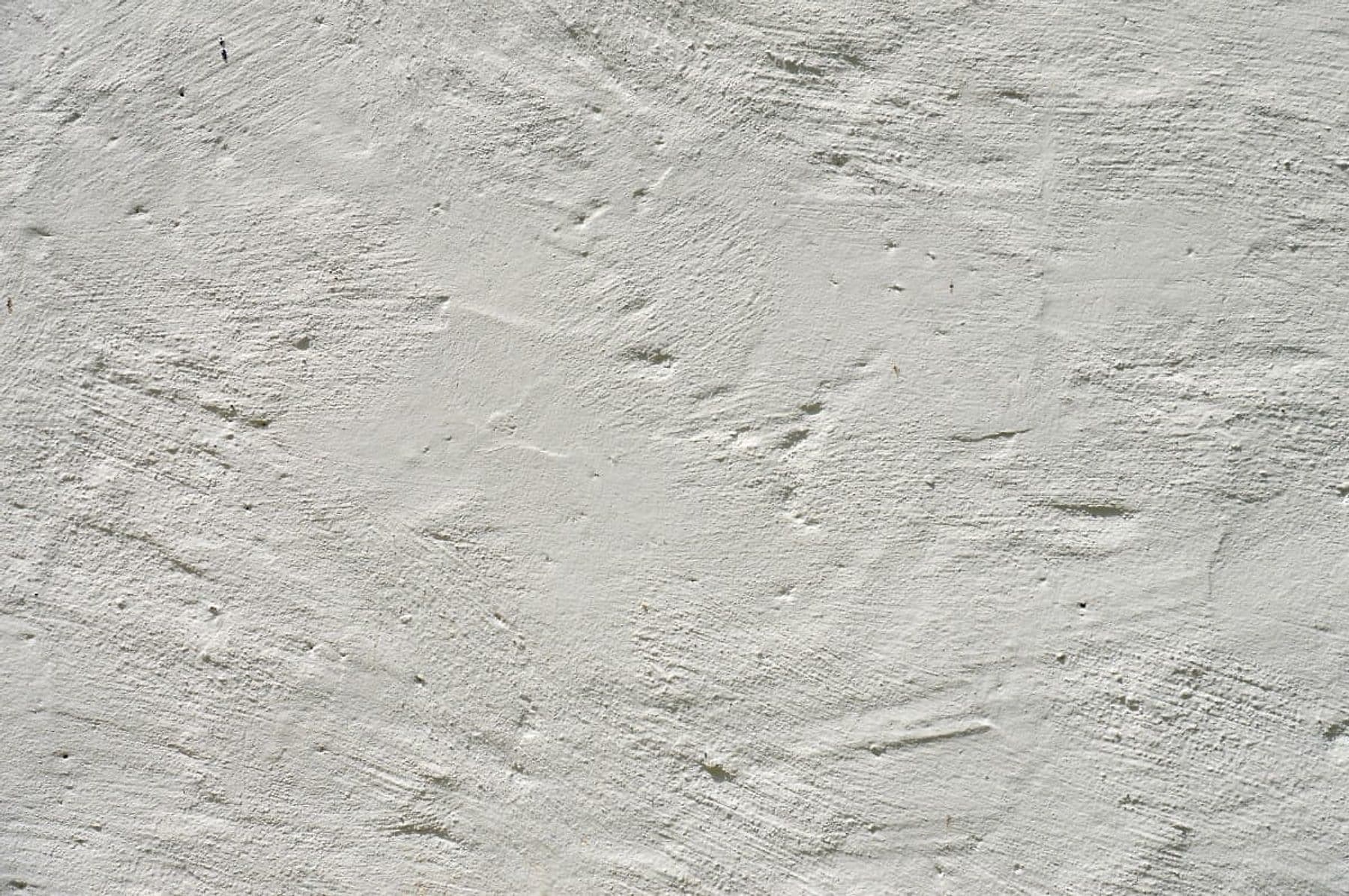 Freshly floated white stucco wall texture